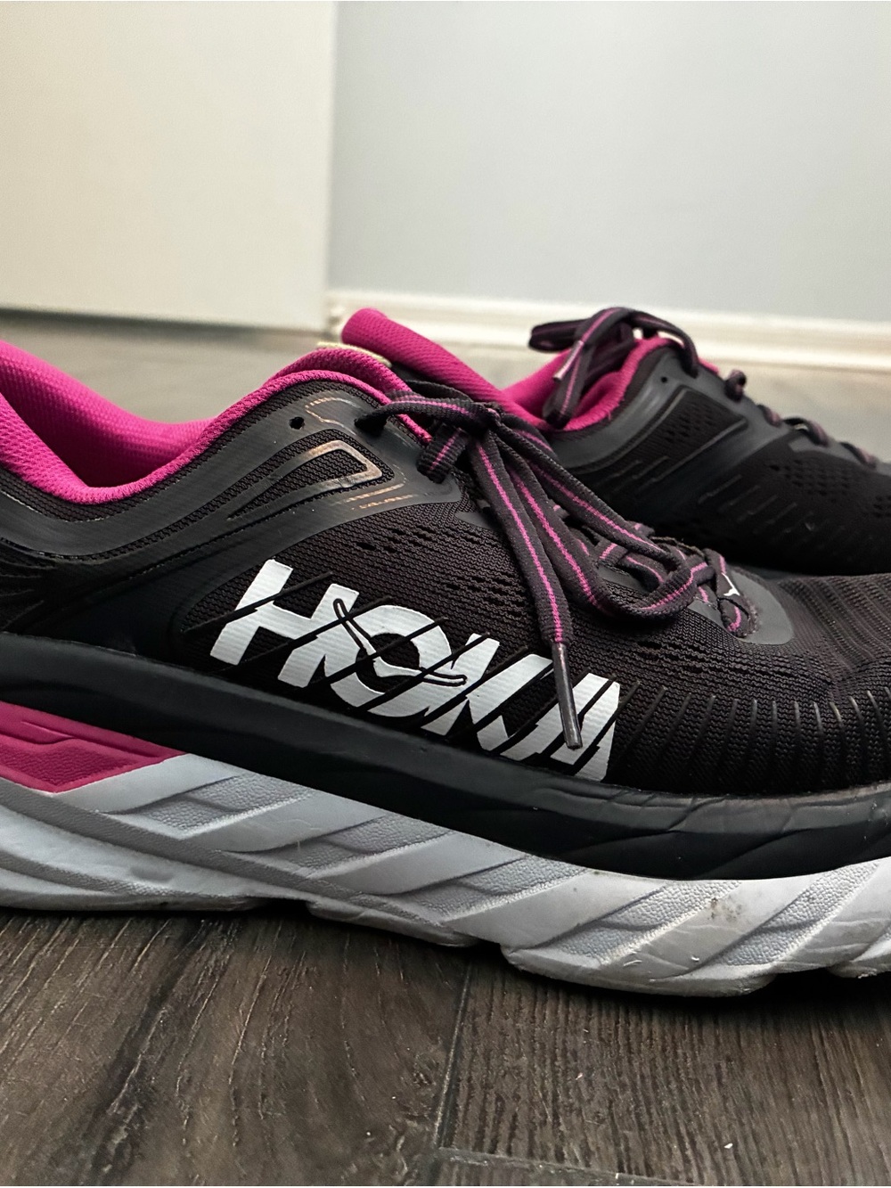 Hoka Women's Black with Pink Trim Athletic Running Shoes